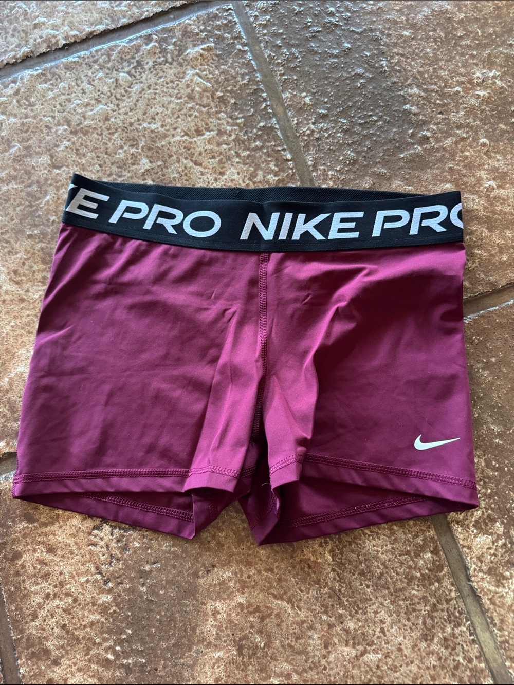 Nike Women's Pro Athletic Shorts in Burgundy with Black Waistband